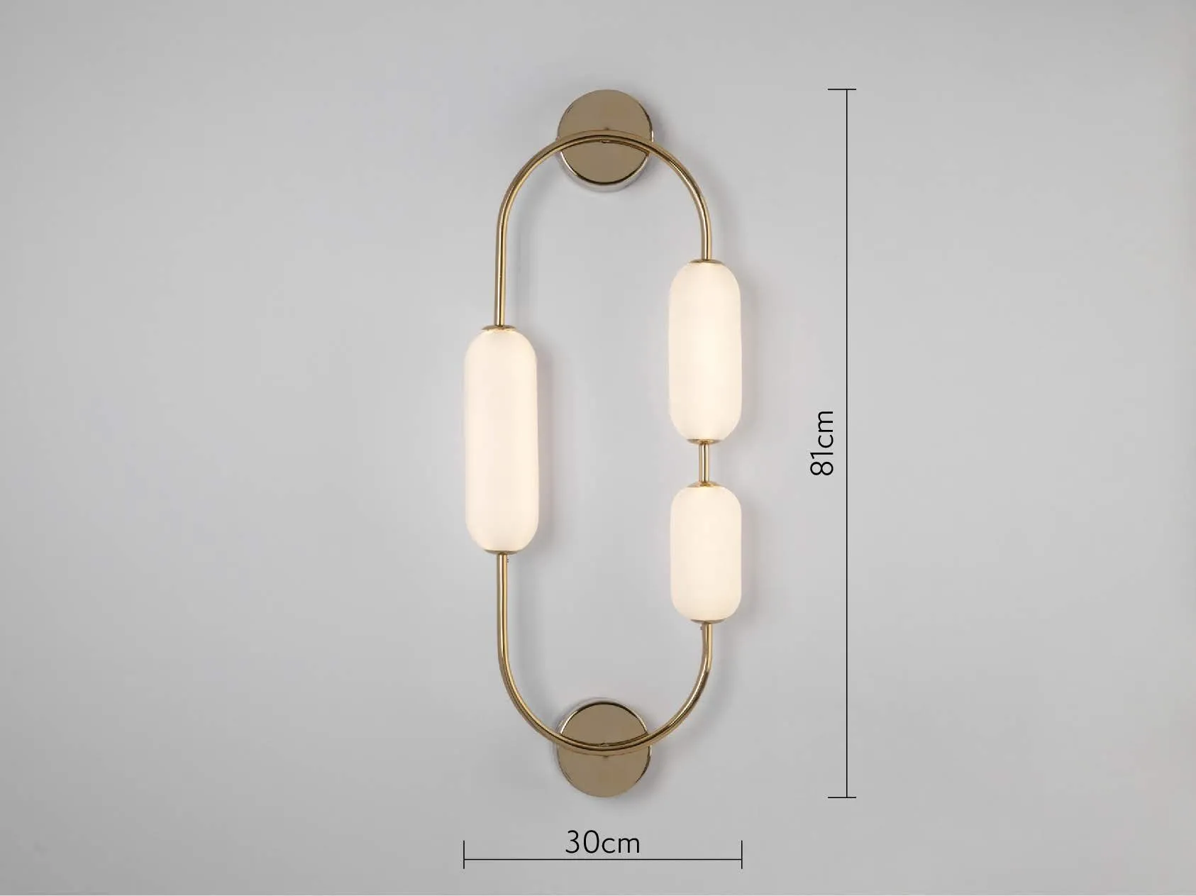 Brass oval pill wall light