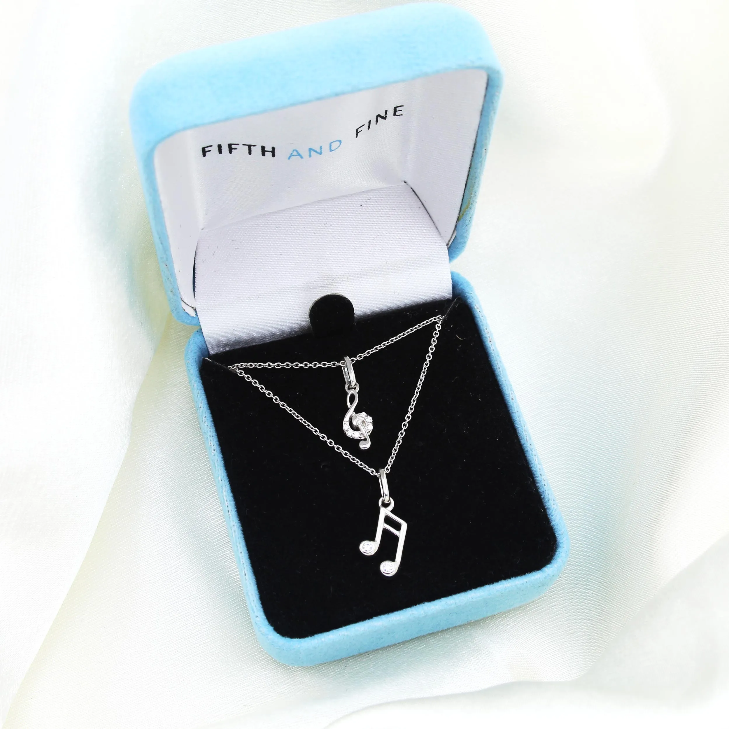 Musical Treble Clef and Eighth Note Layered 1/20 Cttw Natural Diamond Pendant Necklace set in 925 Sterling Silver…